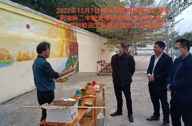 HUANQIU.COM美术教师到油麻二中绘制艺术墙活动